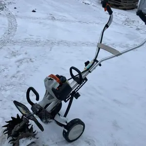 K125. Stihl MM55 garden tiller