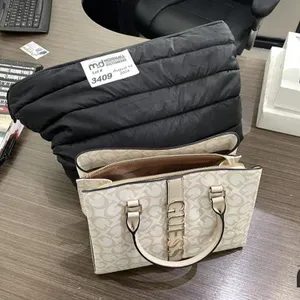 (2) Purses and Contents 
 UNRESERVED