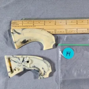 Plastic Grip possibly for 22 or 22 mag; 4"L