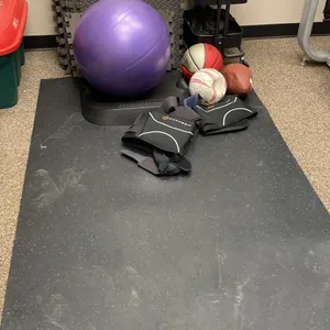 GROUP OF ASSORTED EXERCISE EQUIPMENT, GYM MATS, LIFTING BELTS, BALLS & MORE