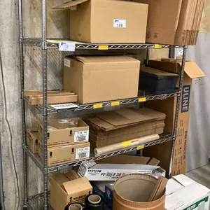 5 TIER MOBILE RACK WITH ASSORTED SHIPPING ITEMS- BOXES, EDGE PROTECTORS, SHRINK WRAP & 2 TABLES