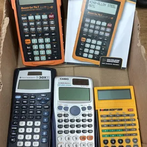 BOX OF ASSORTED CALCULATORS INCLUDING; MACHINIST CALC PRO 2, SONIN INCHMATE 2000 & MORE