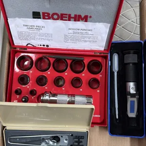 BOX OF ASSORTED ITEMS INCLUDING; HAND HELD REFRACTOMETER, HOLLOW PUNCHES SET, VARIABLE GUIDEBUSH