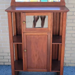Vintage Oak 2-Door Display Cabinet with Mirror . Measures 34" wide , 59" tall & 16 1/4" deep