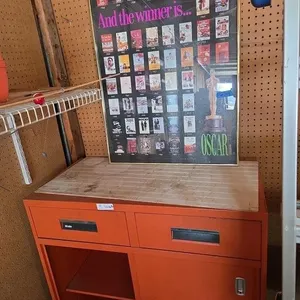 Metal Cabinet & Oscar Poster