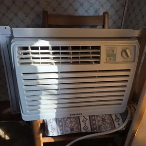 Air Conditioner (Samsung) & Chair w Window Fan