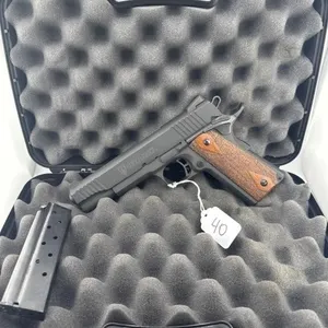 Citadel 1911 9MM
Case and two clips included