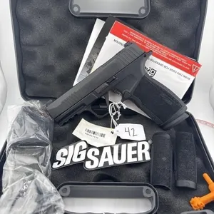 SIG Sauer P365 9MM
Case, two 17 round clips,