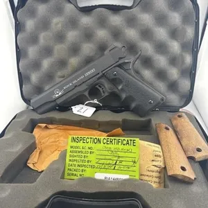 Rock Island M1911 9MM
Case, extra set of wood