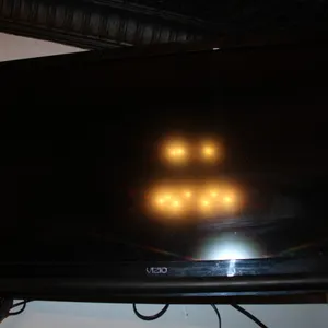 Vizio TV with Roku, Mounted to Wall Approximately 9 Feet Up, Buyer Responsible for Removal