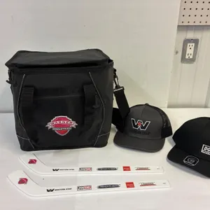 Cooler. Mini hockey sticks. Caps.