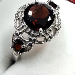 Sterling Silver Natural Garnet (3.12ct) and CZ Ring, Size 7, W/A $650.00.
