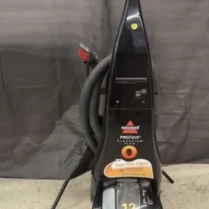 Bissell Carpet Cleaner with Manual. Turns on.