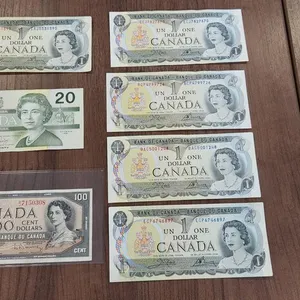 Bank of Canada 1954 $100, 1973 (5) $1 & 1991 $20 Banknotes
 UNRESERVED