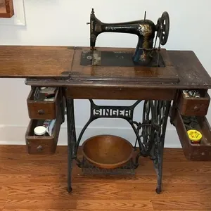 Antique Singer, sewing machine with wooden cabinet
