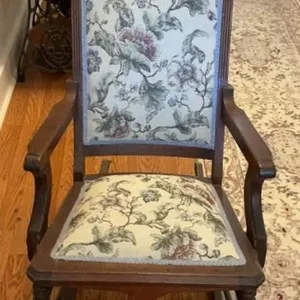 Wooden rocking chair with floral print