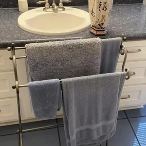 Triple tile rack with contents, oriental vase