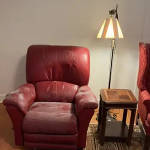 Recliner, small end table, and tall lamp lot