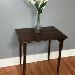 Rectangle, wood table with floral decor