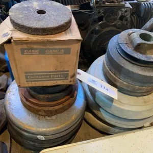 Barbell Weights and Grinding Stones with bar