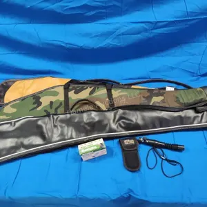 3 gun cases, 4 12ga shells, call and knife