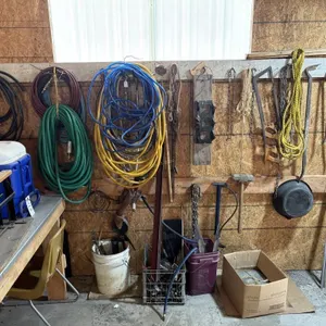 Contents of Wall. Hose, Tools etc