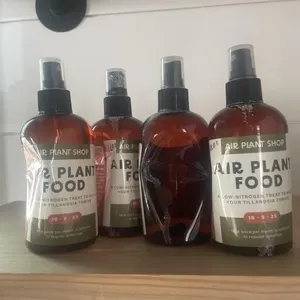 4 bottles of air plant food