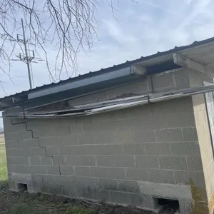 Wood plastic siding, and two metal hooks