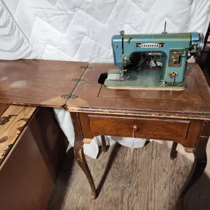 Coronado Sewing Machine in cabinet
