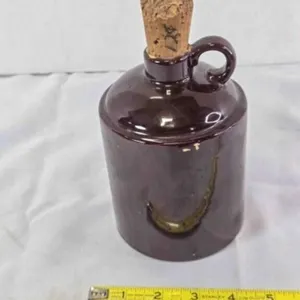 Brown crockery Jug w/stamped cork stopper; 6"