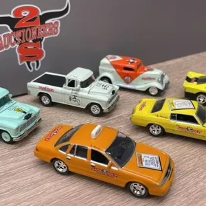 6 Johnny Lightning Monopoly Cars.