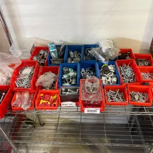 Hardware and Industrial Fasteners Lot Including Anchors, Clamps, Connectors, and Screws