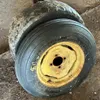 New Samson 6.70-15 tire on 4 bolt rim and used 15” tire on 4 bolt rim