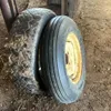 New Samson 6.70-15 tire on 4 bolt rim and used 15” tire on 4 bolt rim
