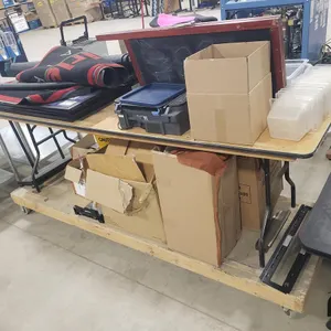 Table Top and Bottom of Misc. Containers, Rubber Mats and More
 UNRESERVED