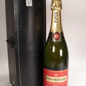 Piper-Heidsieck/ Brut Champagne/ 750ml/ 12% ABV Includes hinged leather like wrapped wine box Note: 