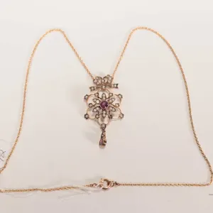 Antique English pearl and amethyst Victorian lavaliere marked 9ct on attached 20" unmarked neck chai