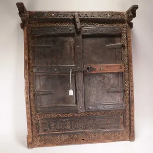 Antique East Asian wooden window with hand carving and hand hammered detailing, overall dimensions 2