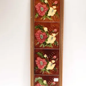 Framed set of four antique Arts & Crafts glazed floral tiles, overall dimensions 24 3/4" X 7"