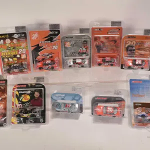 Ten 1: 64 scale die cast collectible Tony Stewart 2002-2005 race cars