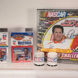 Selection of Darrell Waltrip's collectibles including Racing Challenge trivia game, two 1:64 scale R