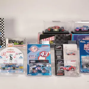 Eight limited edition 1:64th scale Action collectible die cast cars including six Kyle Petty and two