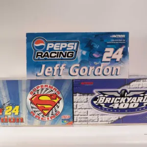 Three limited edition Action 1: 24 scale Jeff Gordon die cast collectible cars including Pepsi Racin