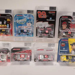 Eight Kevin Harvick limited edition Action 1: 64 scale die cast cars, various themes including Kiss,