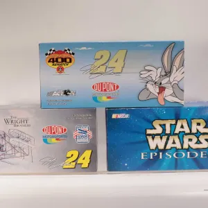 Three limited edition Action 1: 24 scale Jeff Gordon die cast collectible cars including Monte Carlo