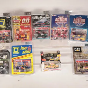 Three limited edition Action 1: 24 scale collectible cars including Kenny Wallace, Joe Nemechek, War