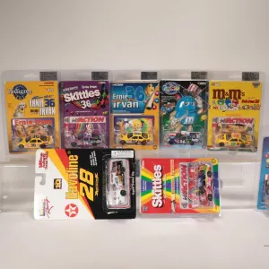Nine Ernie Ervan limited edition Action 1: 64 scale die cast cars including M & M''s, havoline, Wins