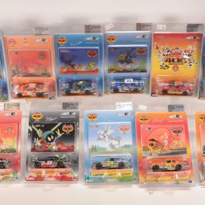 Eleven assorted limited edition Action 1: 64 scale Monte Carlo 400 Rematch collectible cars includin