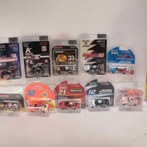 Twelve 1:64 scale collectible die cast race cars including Casey Mears, Kerry Earnhardt, Steve Pack,