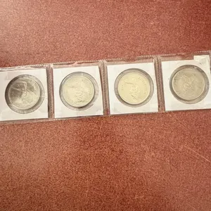 IN - (4) 1974 Canadian One Dollar Coins
